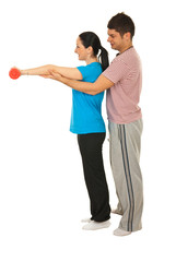 Fototapeta premium Trainer man helping woman