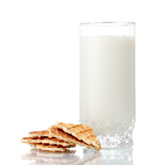 glass of milk and cookies isolated on white
