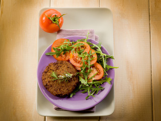 soy steak with arugua and tomatoes salad