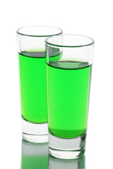 Two glasses of absinthe isolated on white