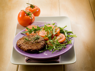 soy steak with arugua and tomatoes salad