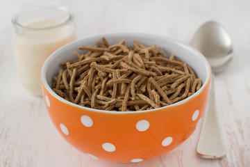 cereals in the bowl with spoon