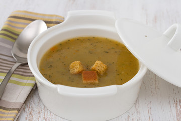 vegetable soup in the bowl and spoon