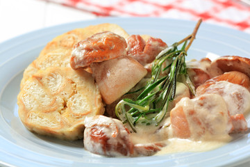 Porcini mushrooms in cream sauce and dumplings