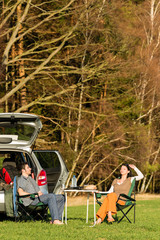 Camping car young couple relax picnic countryside