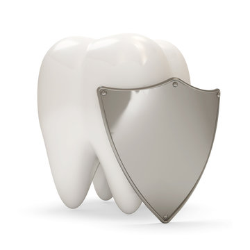 Teeth with metal shield on white background