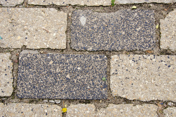 Background of old grunge street pavement of brick