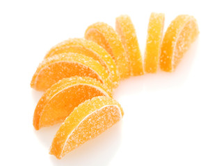 orange jelly candies isolated on white