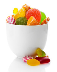 colorful jelly candies in bowl isolated on white