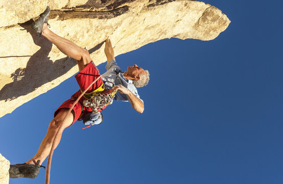 Middle aged male rock climber.