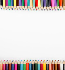 Close up of color pencils with different color over white backgr