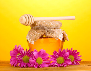 Sweet honey in jar with drizzler