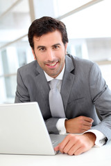 Portrait of confident businessman in meeting