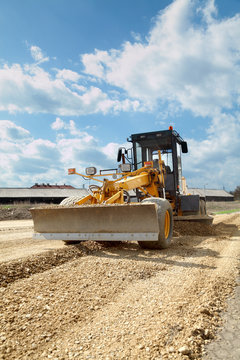 Grader at construction site