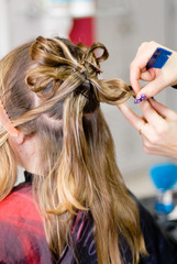 Fototapeta premium Hairdo rear view of a beautiful woman & elegant hairstyle