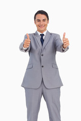 Smiling man in suit the thumbs-up