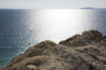 View from tip of rock out to sea. Water background