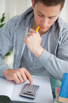 Student Using A Calculator