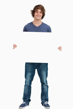 Male Student Holding A White Board