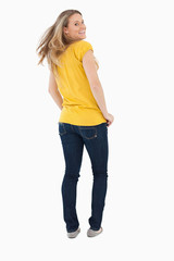 Back view of a young woman with waving hair