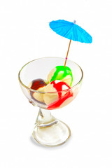 ice cream balls in a glass beaker isolated on white background