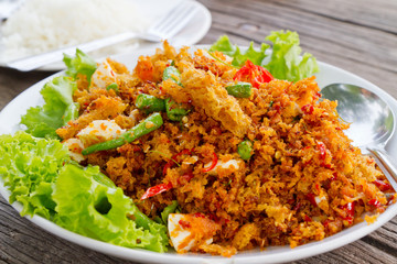 deep fired fish mixed with spicy sauce