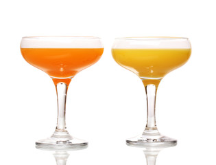 Tropical juices in glasses isolated on white