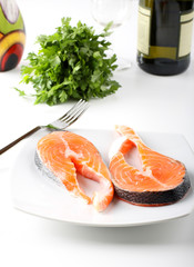 Raw salmon on dish