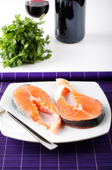 Raw salmon on dish