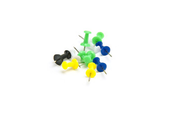 Different color pins isolated on white