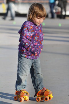young girl on roller skates