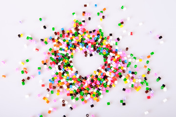 Play beads in the shape of a heart