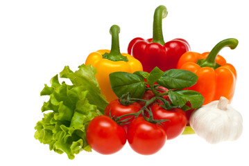 Fototapeta na wymiar Tomatoes, garlic, lettuce, peppers, basil