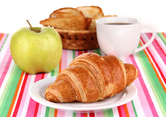 Classical breakfast. Orange juice and croissant