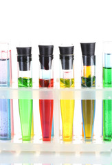 Different laboratory glassware with color liquid isolated