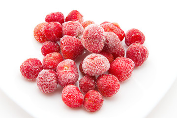 sweet, luscious frozen strawberries on white