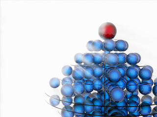 Pyramid of blue balls with red on the top on a white background