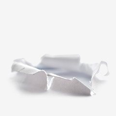 white paper torn outside