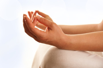 exercising yoga - detail of hand