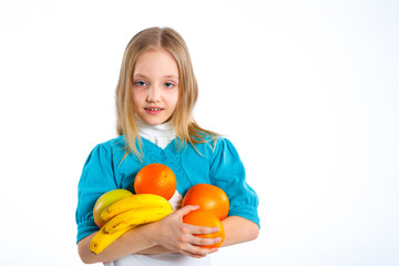 Fototapeta na wymiar cute little girl with fruits
