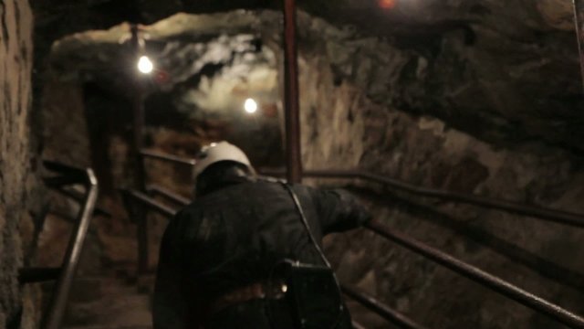 Miner on stairs