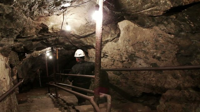 Man descending in mine