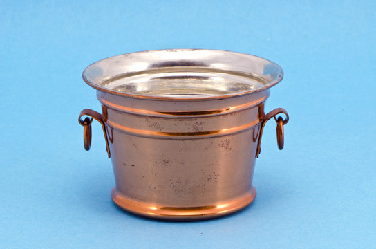 Copper Vessel On Azure Background