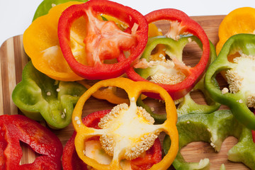 close up of red, yellow and green peppers