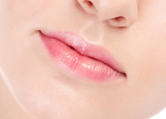 Close-up face of beauty young woman. Lips zone