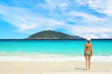 Fototapeta na wymiar Lonely woman bikini by the sea