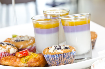 Sweet little fruit tart with strawberries and mango mouse desser