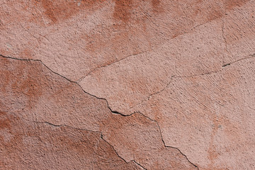 Cracked pink wall texture background