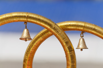 Two wedding bells on wedding rings