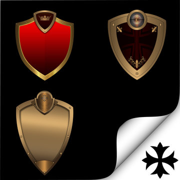 Three abstract shield on a black background.
